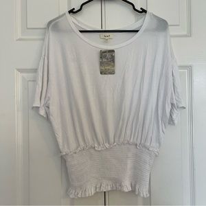 White shirt loose at the shoulders